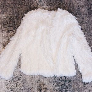 White furry jacket